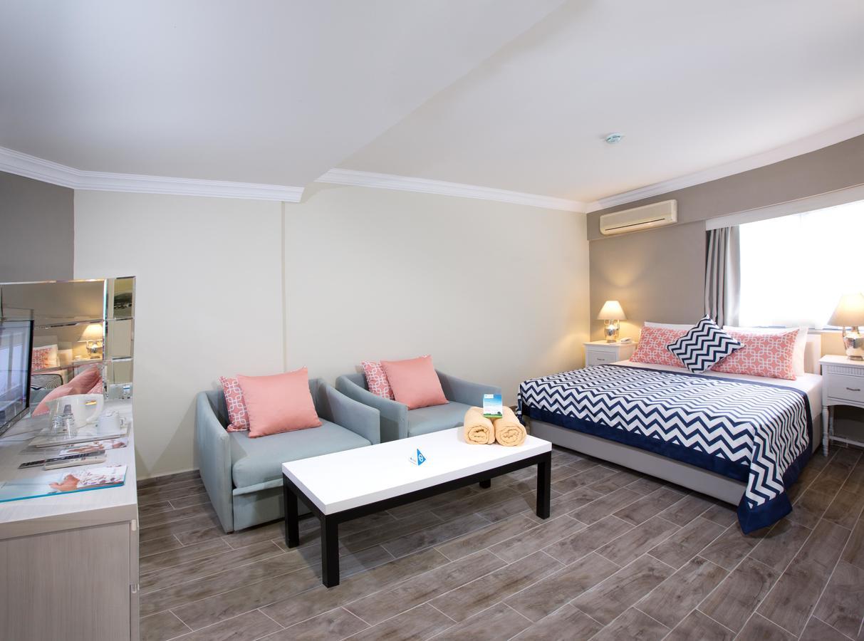 Paloma Marina Suites - Adult Only 库萨达斯 外观 照片